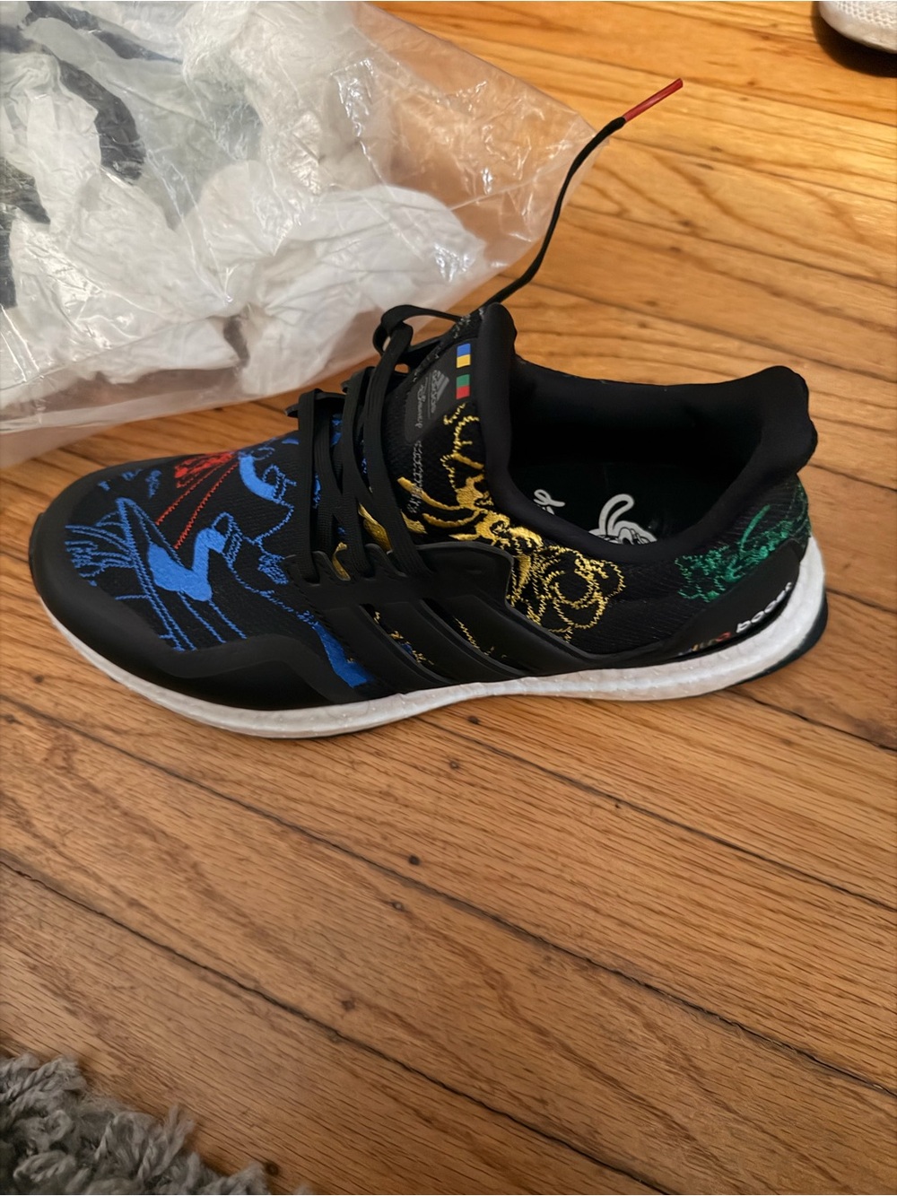 Disney x adidas Ultraboost -Black Sneaker with Blue, Red, Yellow & Green Accents